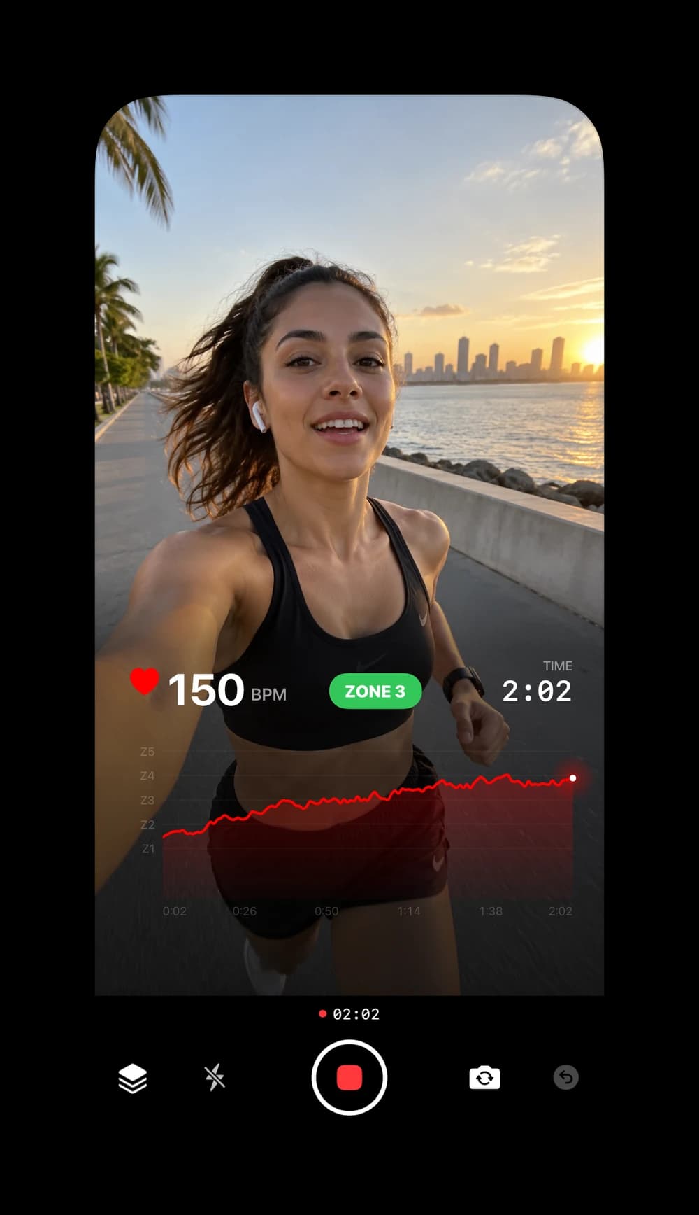 FitCam live camera showing a runner's heart rate, training zone and heart rate chart, with recording controls below